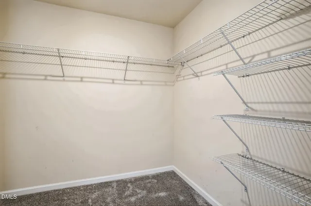 a view of a room with racks on the wall