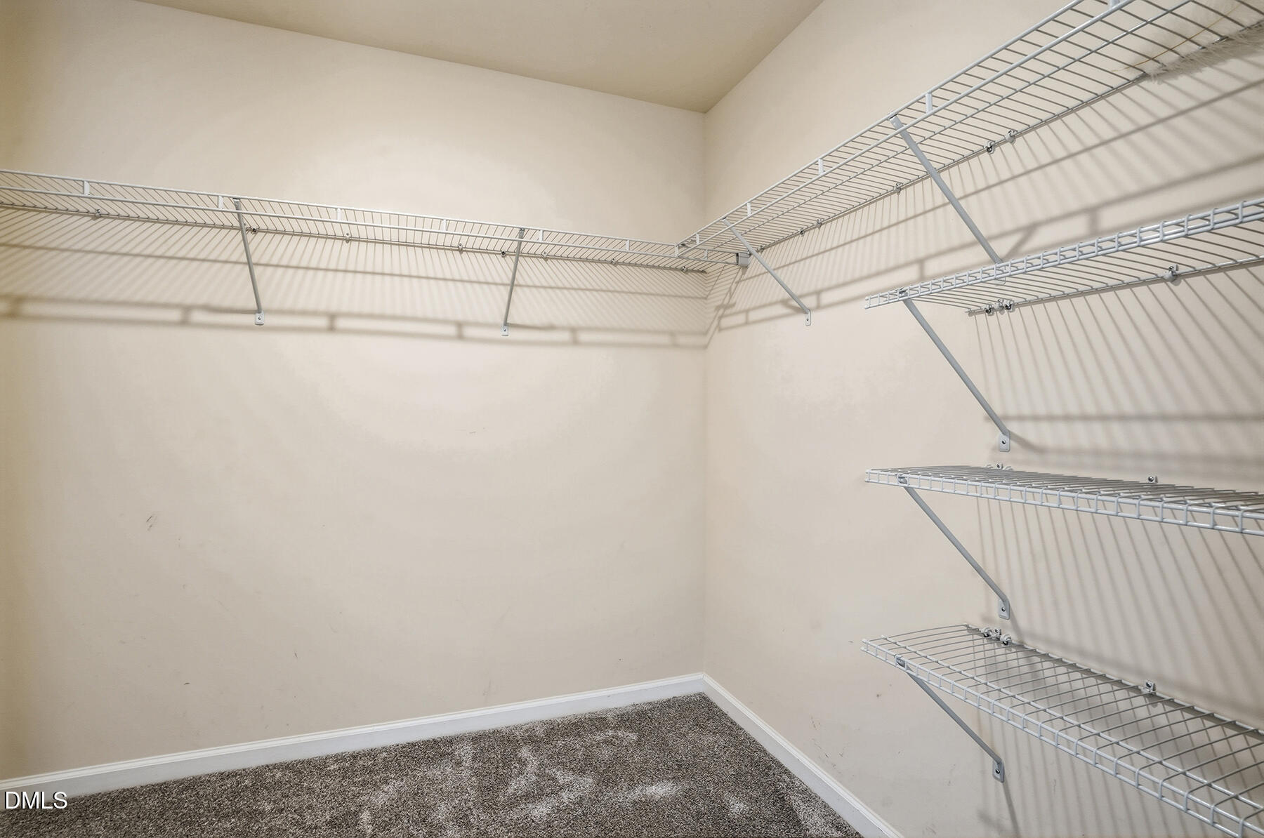 2116 Water Marsh Trail Fuquay-Varina, NC 27526 - Photo 23 of 28 a view of a room with racks on the wall