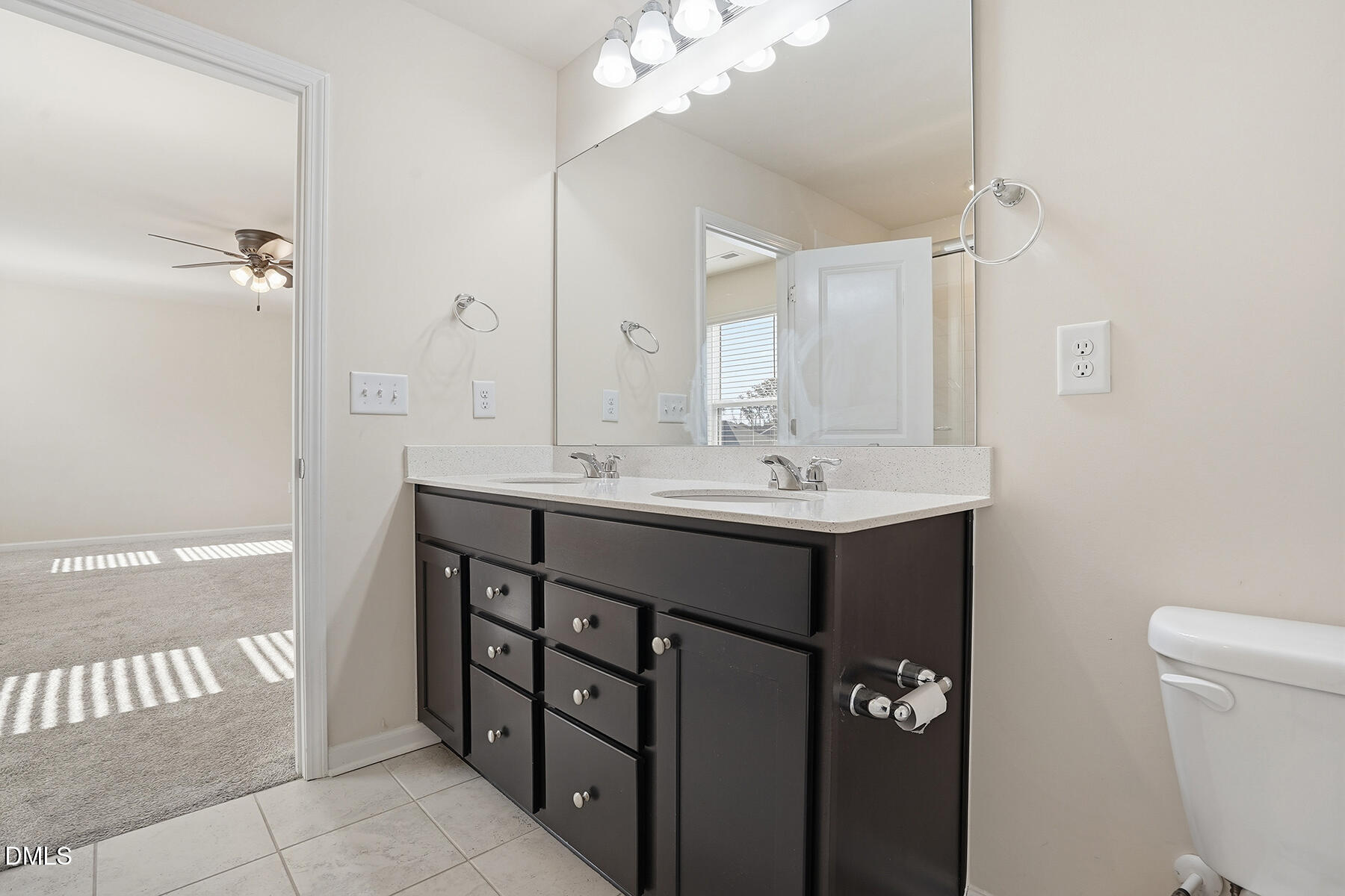 2116 Water Marsh Trail Fuquay-Varina, NC 27526 - Photo 24 of 28 a bathroom with a sink vanity and a mirror