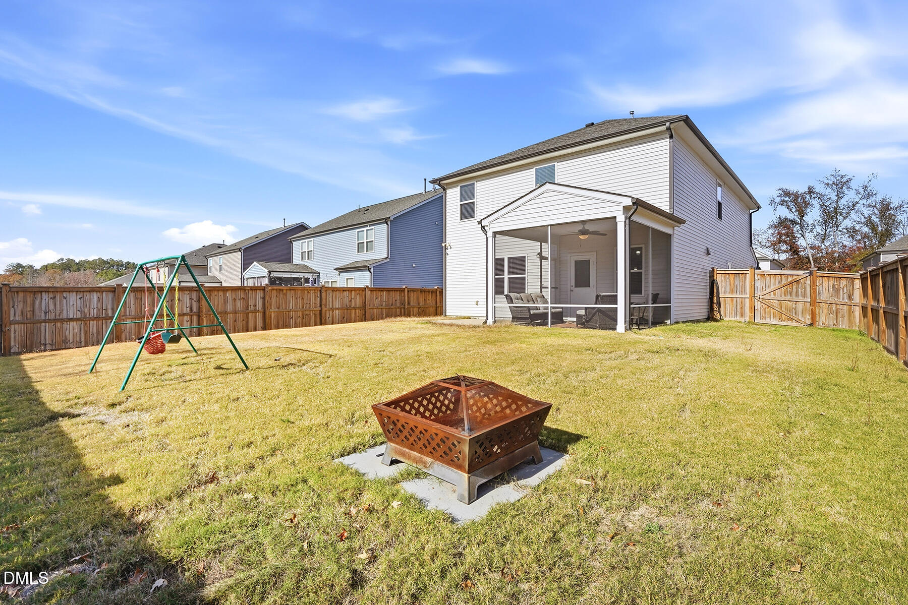 2116 Water Marsh Trail Fuquay-Varina, NC 27526 - Photo 27 of 28 a view of a white house with a yard