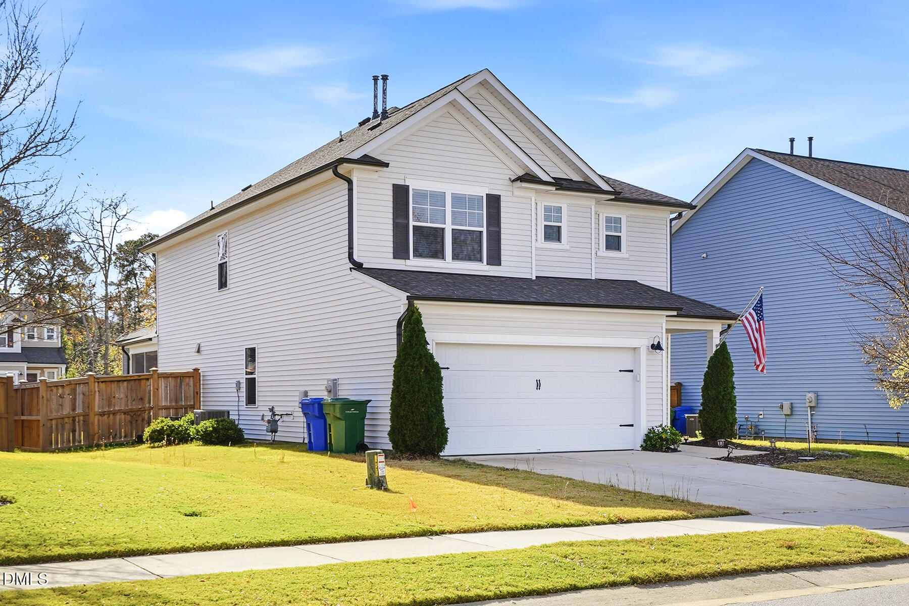 2116 Water Marsh Trail Fuquay-Varina, NC 27526 - Photo 3 of 28 a view of a white house with a outdoor space