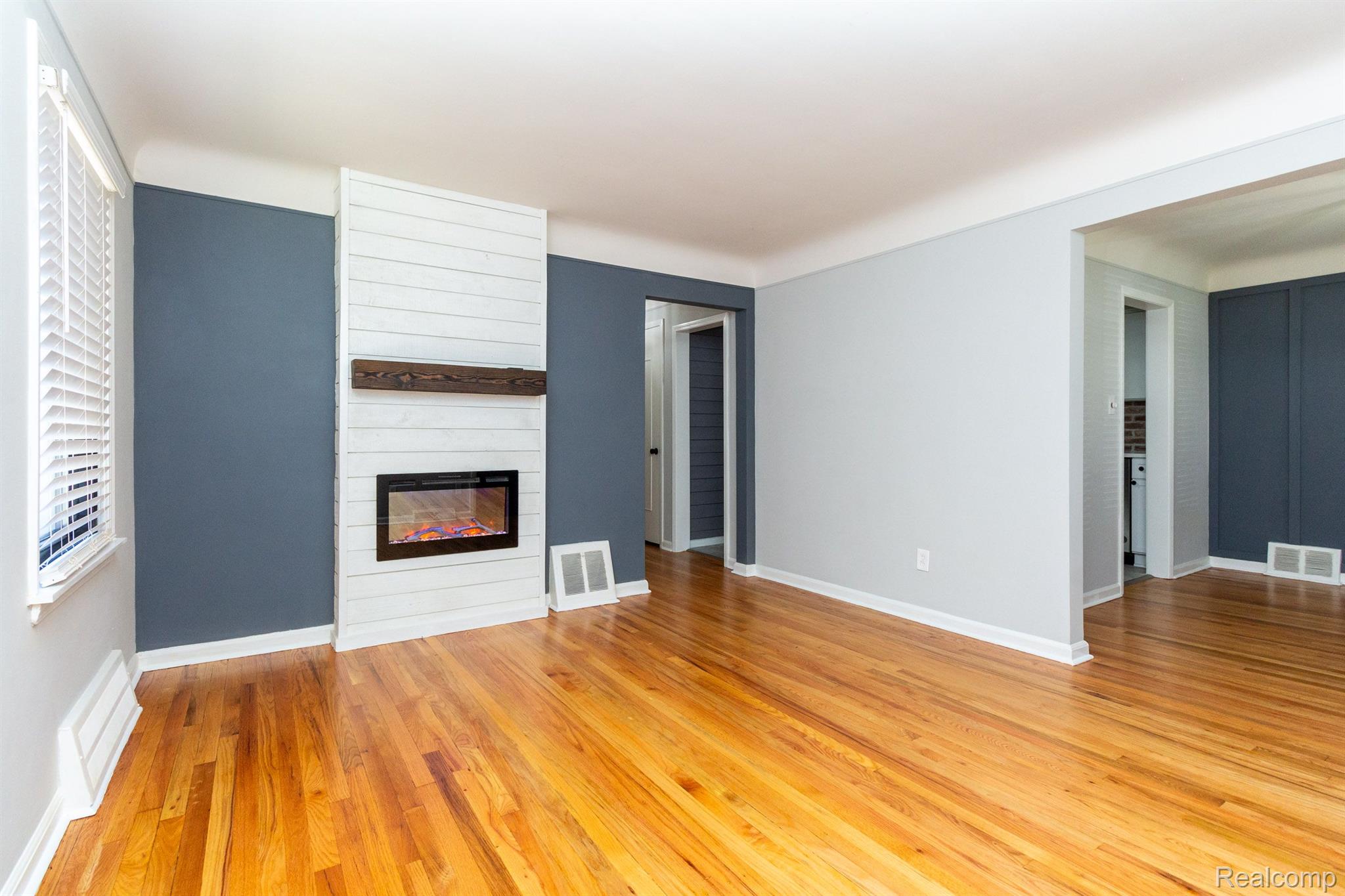15239 Champaign Road Allen Park, MI 48101 - Photo 6 of 34 LIV RM W/NICE ELECT F.P. W/REMOTE CONTROL&BLOWER!