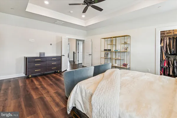 a bedroom with two beds and a table