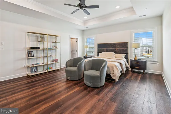 a view of a livingroom with furniture and a flat screen tv