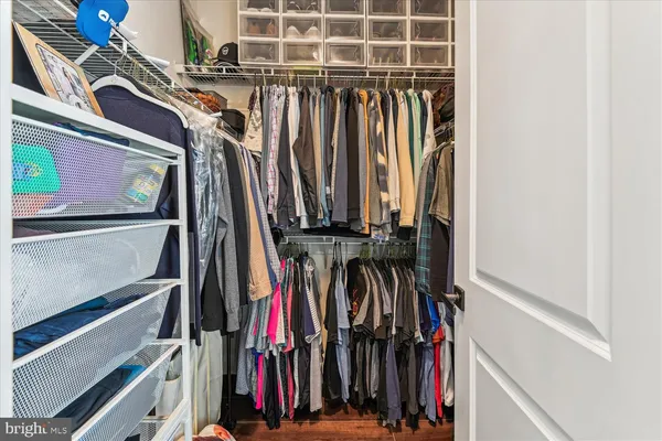 a living room with furniture fireplace and flat screen tv