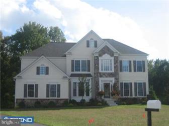 229 Hopkins Road Mickleton, NJ 08056 - Photo 1 of 11 a front view of a house with garden