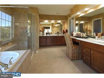 229 Hopkins Road Mickleton, NJ 08056 - Photo 6 of 11 a bathroom with a tub sink shower and mirror