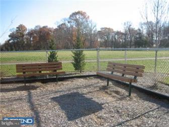 229 Hopkins Road Mickleton, NJ 08056 - Photo 10 of 11 a view of a bench in a yard