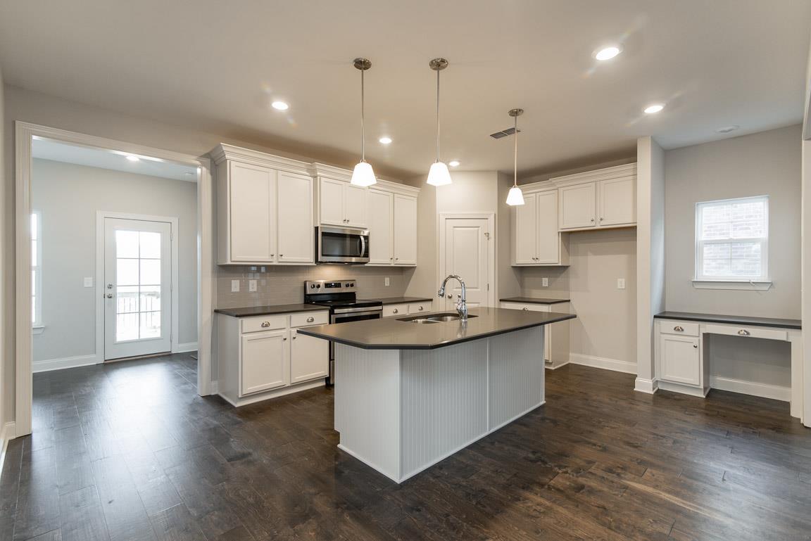 413 Butler Road Mount Juliet, TN 37122 - Photo 8 of 24 Large kitchen island with quartz countertops.