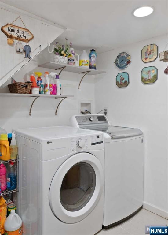 10 Trinity Place Kearny, NJ 07032 - Photo 26 of 30 a utility room with dryer and washer