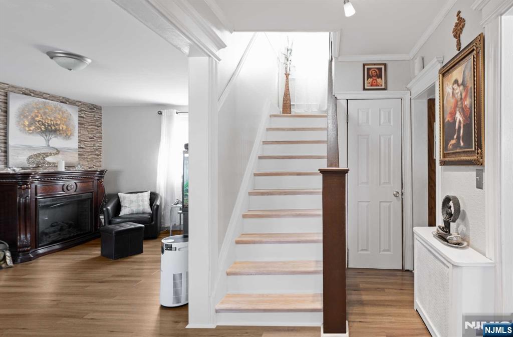 10 Trinity Place Kearny, NJ 07032 - Photo 8 of 30 a view of a hallway with wooden floor and entryway
