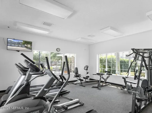 a view of a room with gym equipment