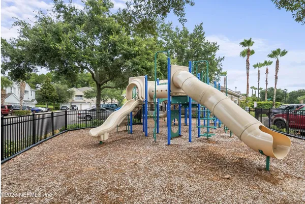 a view of a wooden deck and a slide
