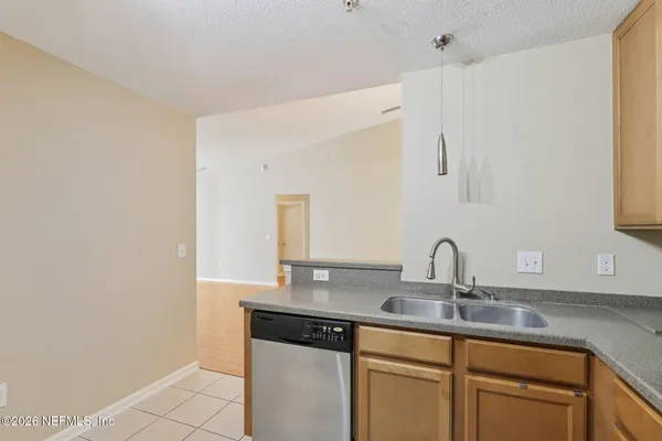 a close view of a sink and a vanity in the bathroom