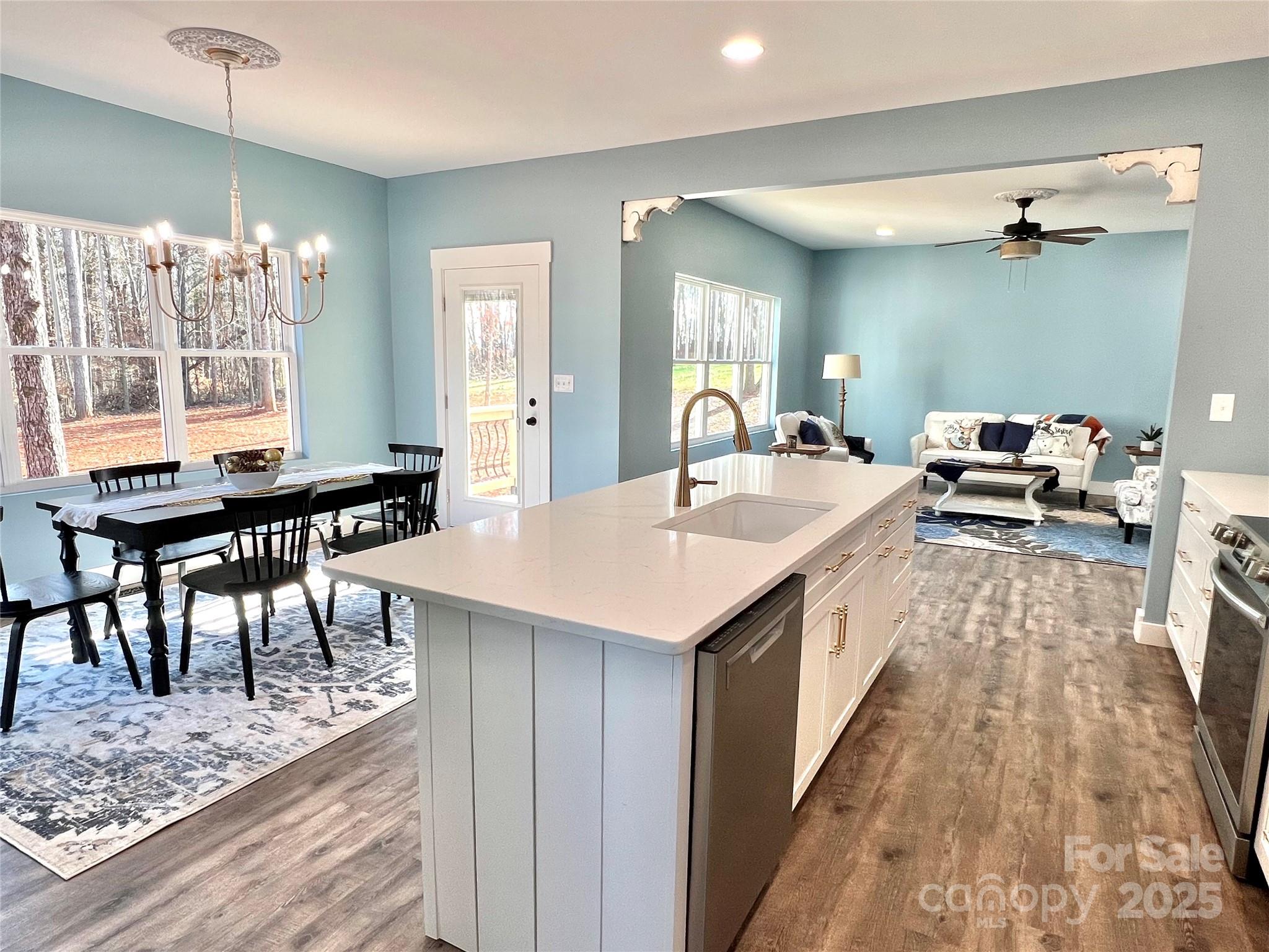 122 Arrowood Lane Harmony, NC 28634 - Photo 12 of 47 a large kitchen with kitchen island a island in it