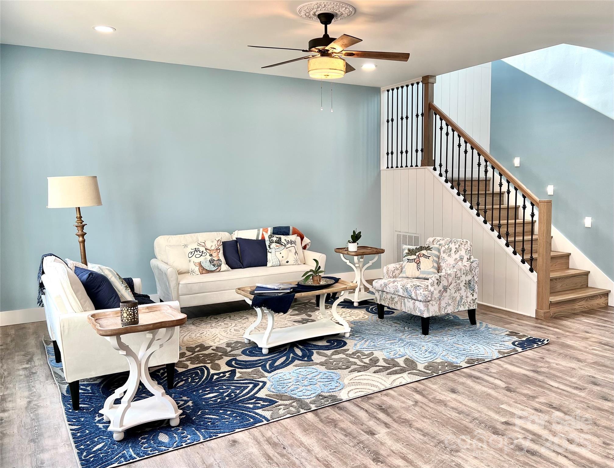 122 Arrowood Lane Harmony, NC 28634 - Photo 15 of 47 a living room with furniture and a wooden floor