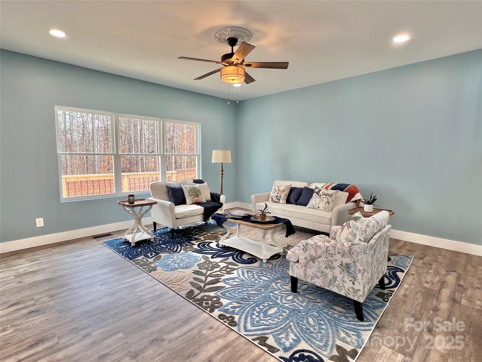 122 Arrowood Lane Harmony, NC 28634 - Photo 16 of 47 a living room with furniture and a window
