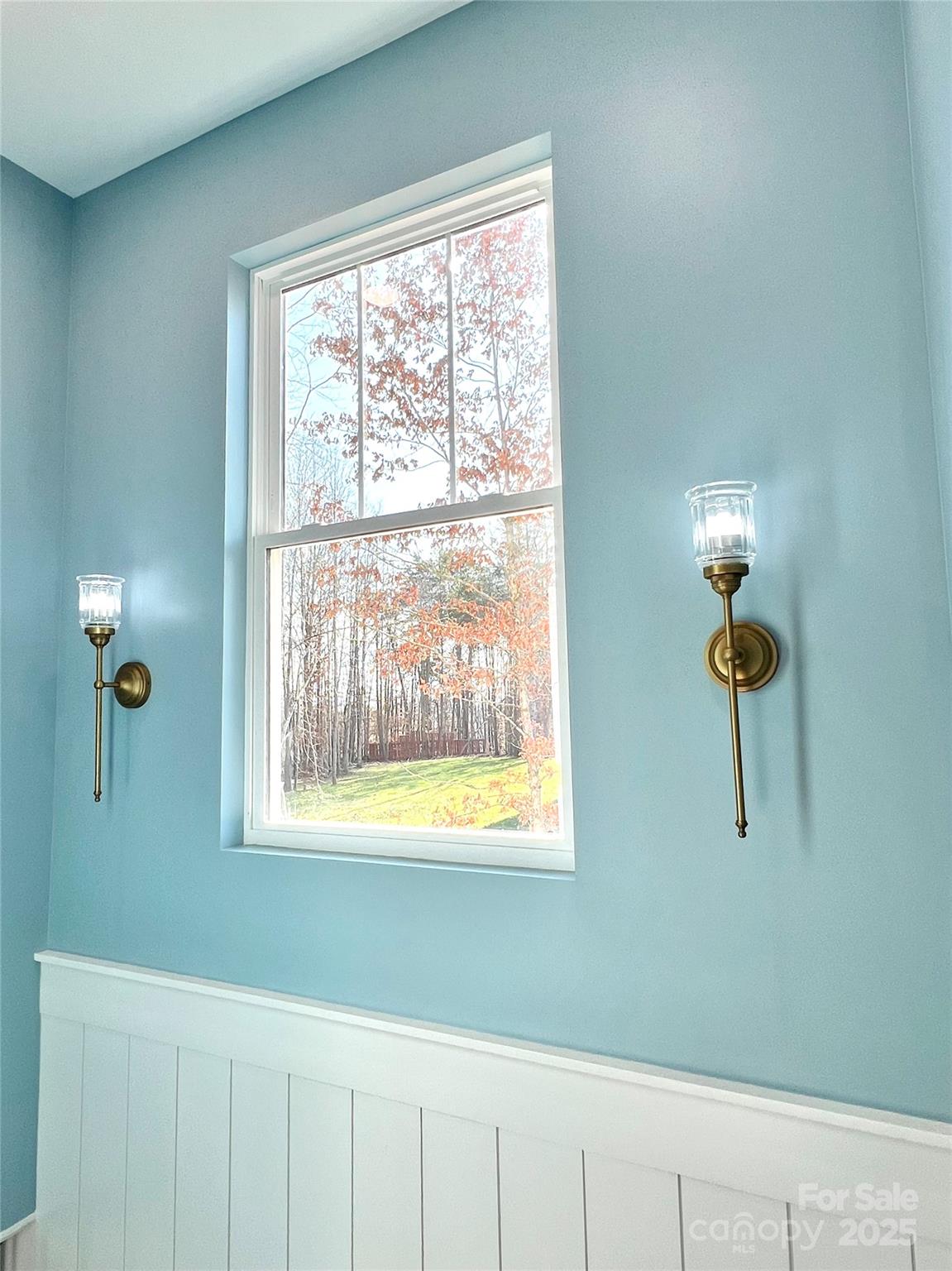 122 Arrowood Lane Harmony, NC 28634 - Photo 19 of 47 a bathroom with a window and mirror