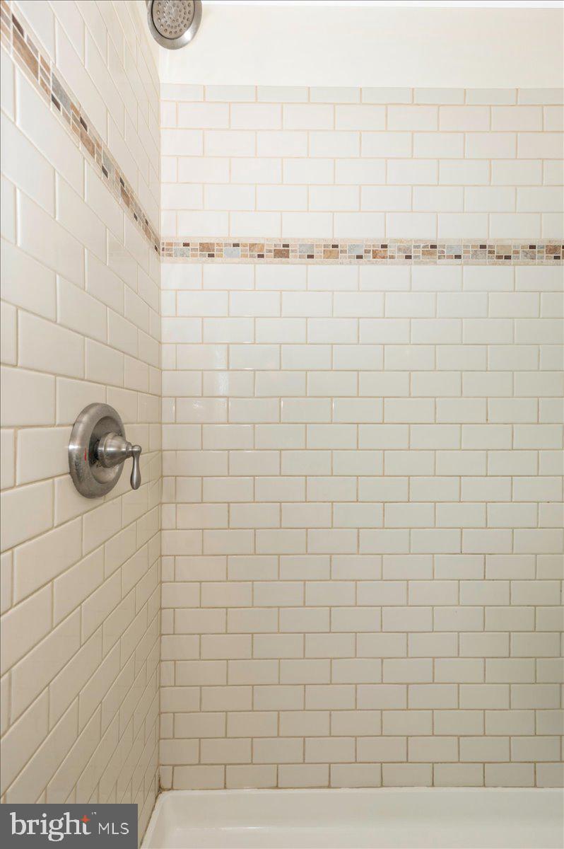 17400 Hughes Road Poolesville, MD 20837 - Photo 46 of 101 a bathroom with a shower