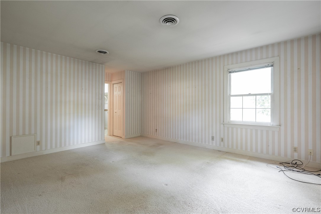 341 Rossmere Drive Midlothian, VA 23114 - Photo 22 of 35 an empty room with windows