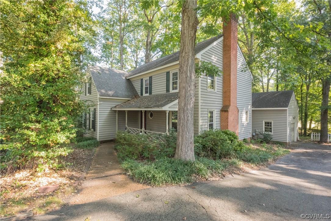 341 Rossmere Drive Midlothian, VA 23114 - Photo 32 of 35 a front view of a house with yard and trees