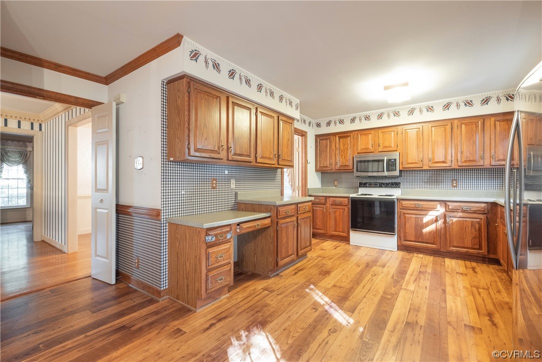 341 Rossmere Drive Midlothian, VA 23114 - Photo 7 of 35 a kitchen with stainless steel appliances granite countertop a sink a stove and a refrigerator