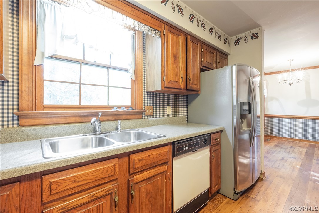 341 Rossmere Drive Midlothian, VA 23114 - Photo 9 of 35 a kitchen with stainless steel appliances granite countertop a refrigerator and a sink