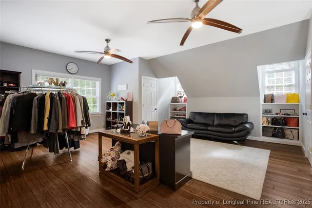 a utility room with cabinets washer and dryer