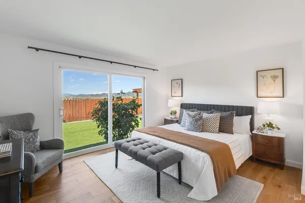 an aerial view of a house with a lake view