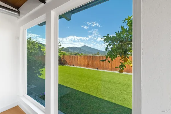 a bedroom with a bed and couch