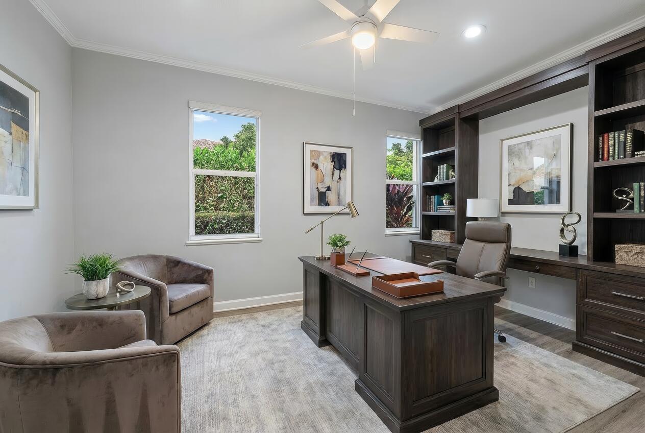 9790 Southeast Crape Myrtle Court Hobe Sound, FL 33455 - Photo 24 of 74 a room with furniture and window