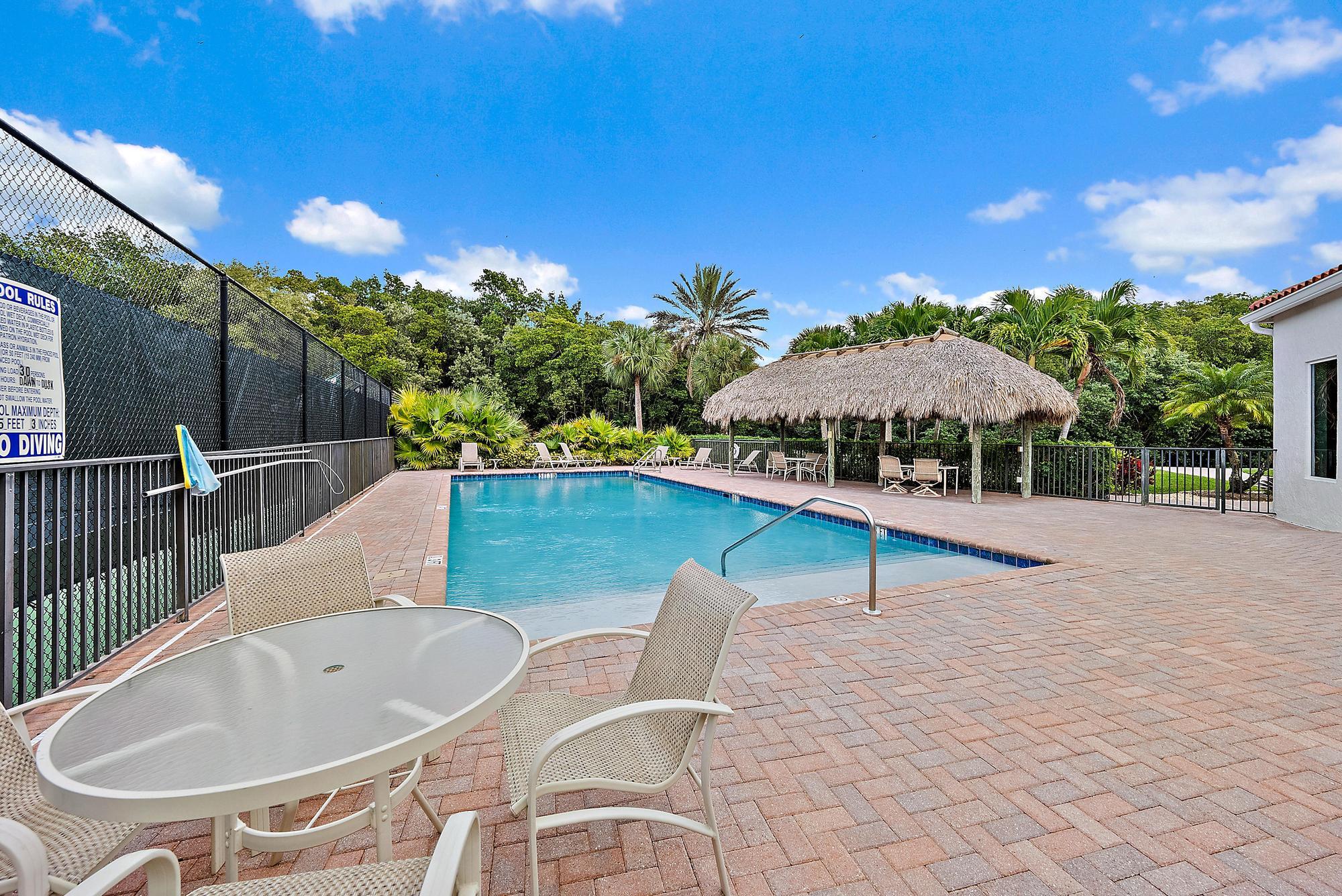 9790 Southeast Crape Myrtle Court Hobe Sound, FL 33455 - Photo 42 of 74 Heated Community Pool & Tiki Hut