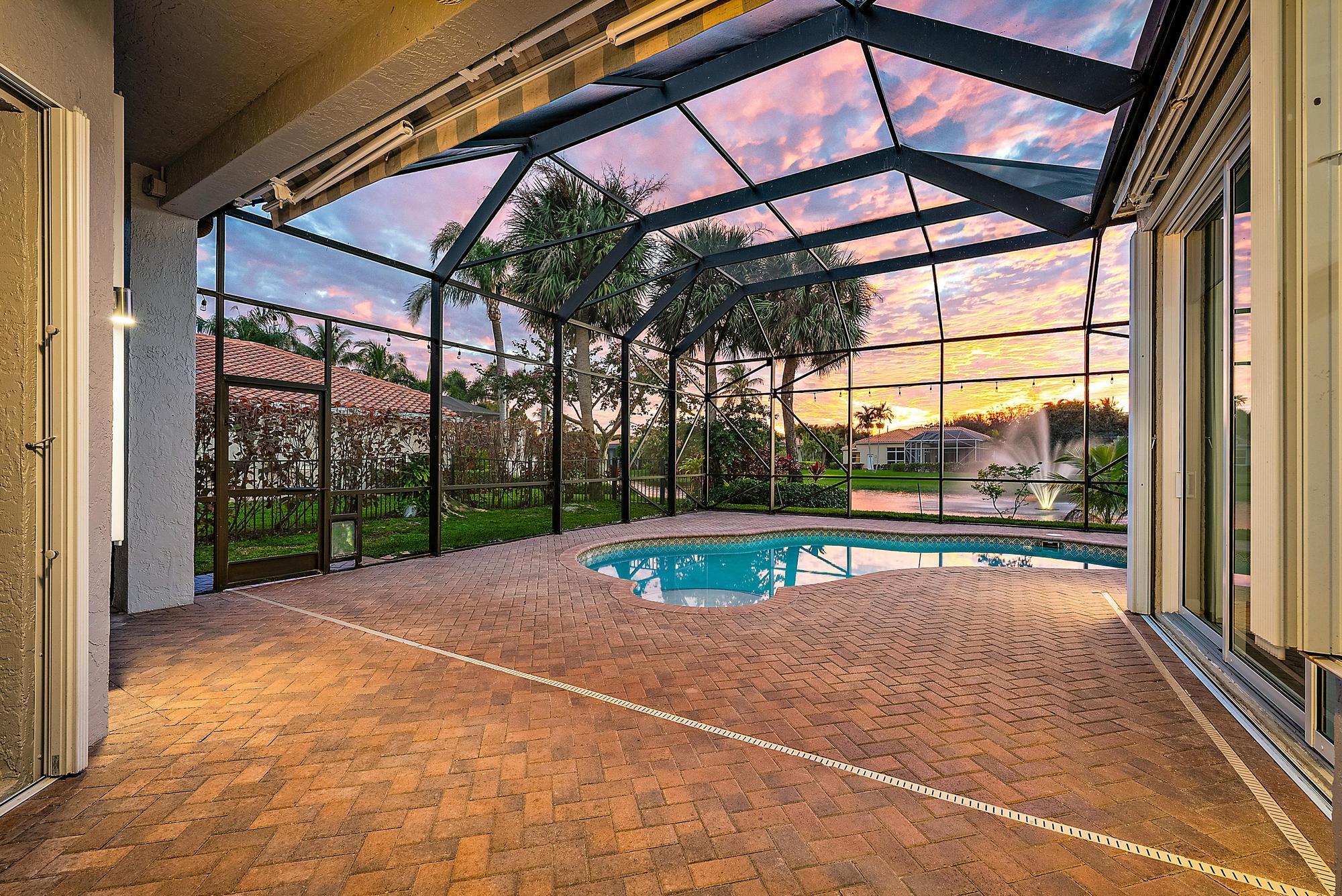 9790 Southeast Crape Myrtle Court Hobe Sound, FL 33455 - Photo 73 of 74 a view of swimming pool with a yard