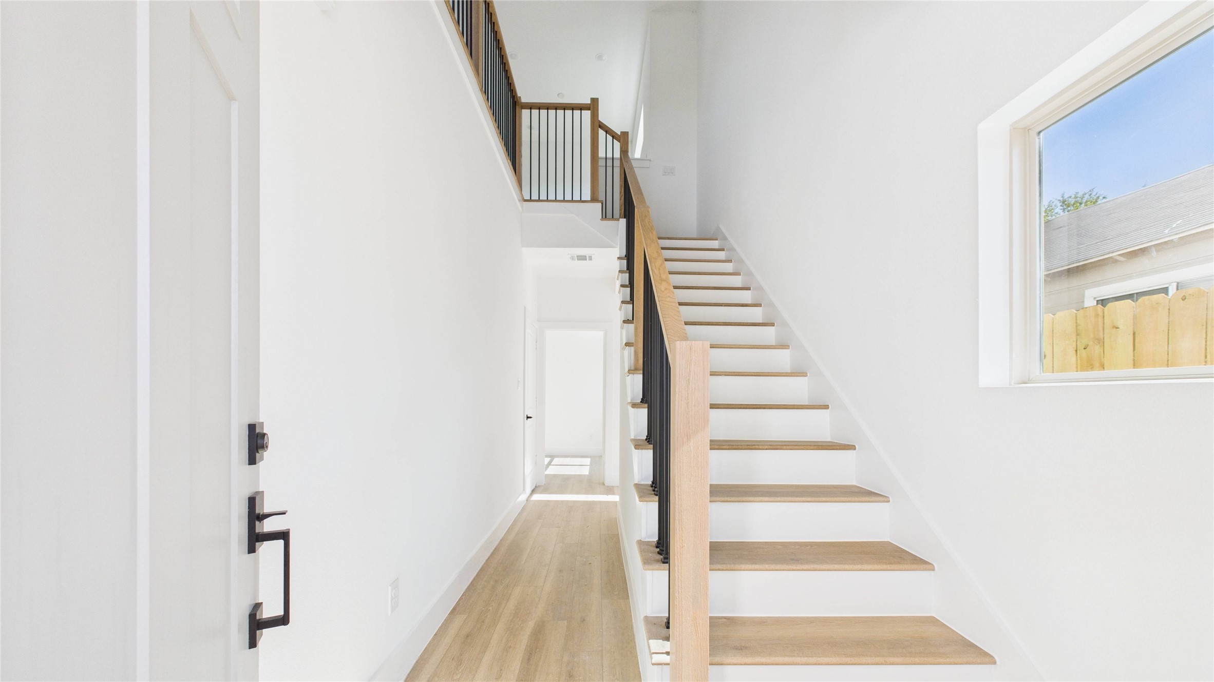5314 Terry Street Houston, TX 77009 - Photo 3 of 29 Entryway to downstairs bedroom or 2nd story stairs