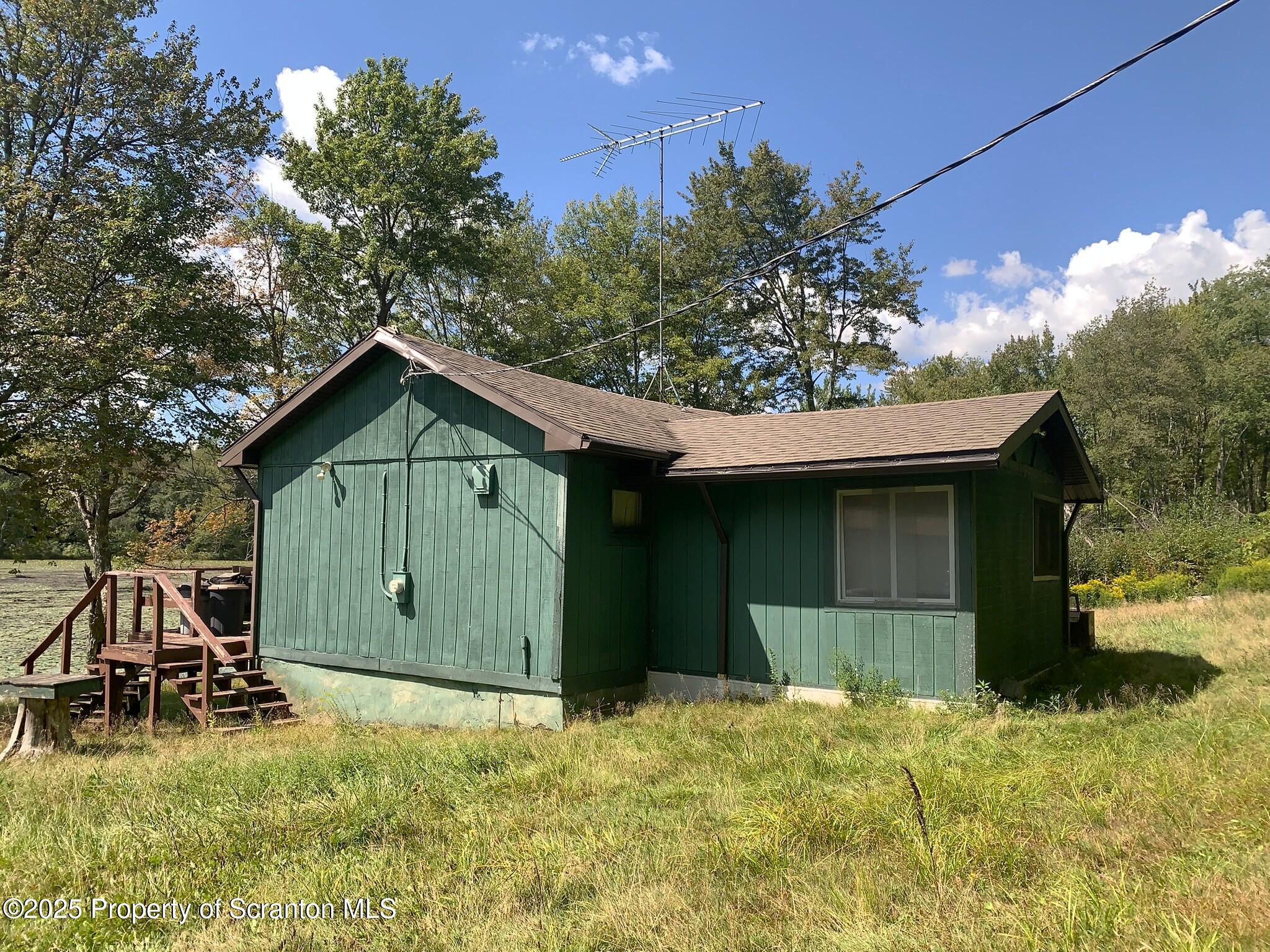 434 Romobe Lake Road Thompson, PA 18465 - Photo 20 of 21 Side