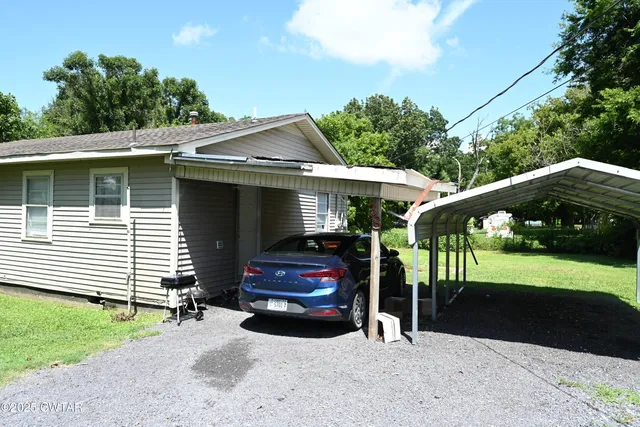 a house view with a garden space