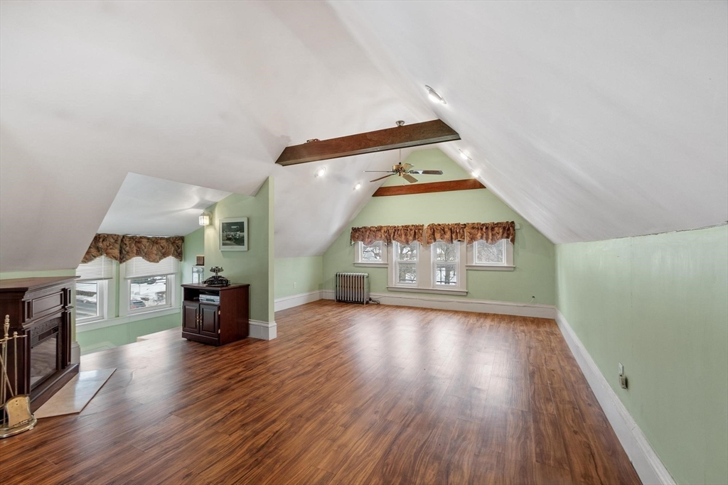 741 Salem Street Lynnfield, MA 01940 - Photo 22 of 41 a view of an empty room with wooden floor
