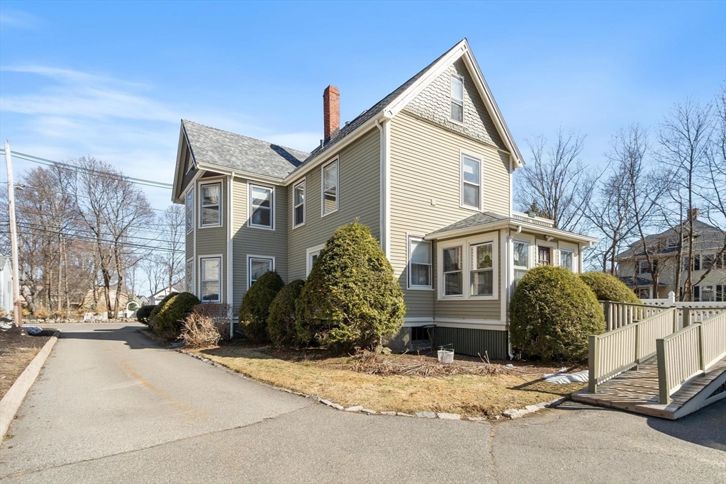 741 Salem Street Lynnfield, MA 01940 - Photo 37 of 41 a front view of a house with a yard