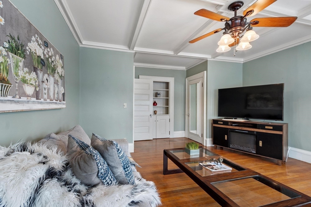 741 Salem Street Lynnfield, MA 01940 - Photo 5 of 41 a living room with furniture and a flat screen tv