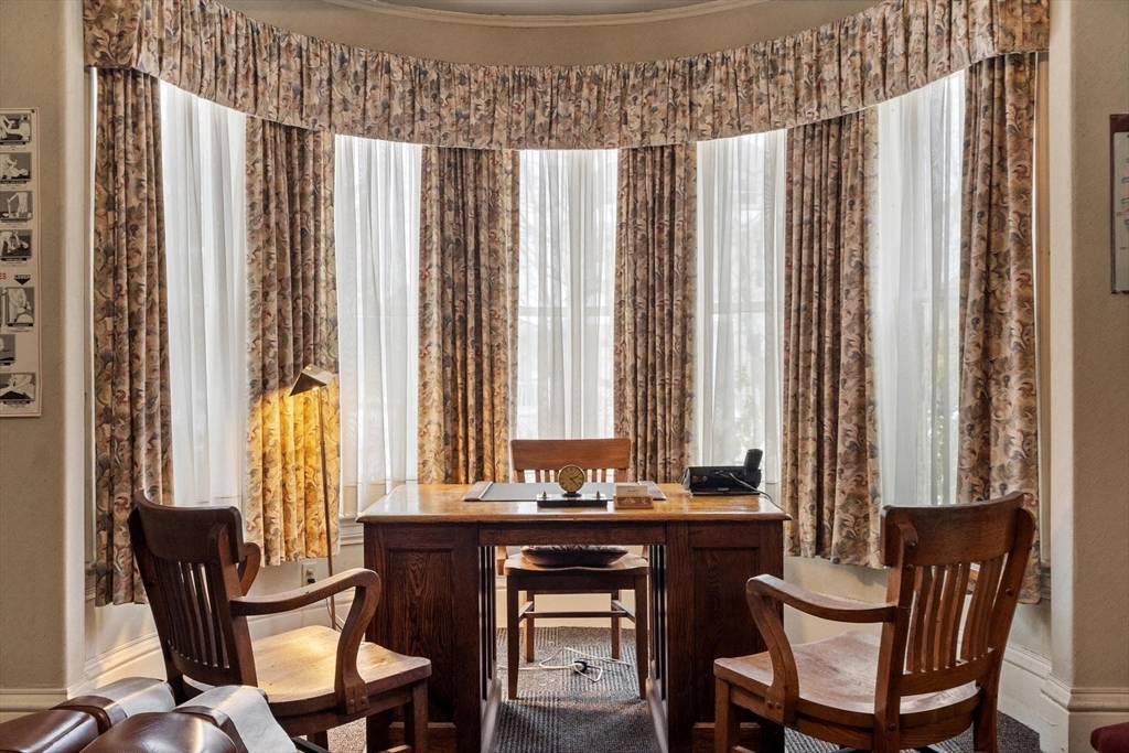 741 Salem Street Lynnfield, MA 01940 - Photo 10 of 41 a view of a dining room with furniture and a window