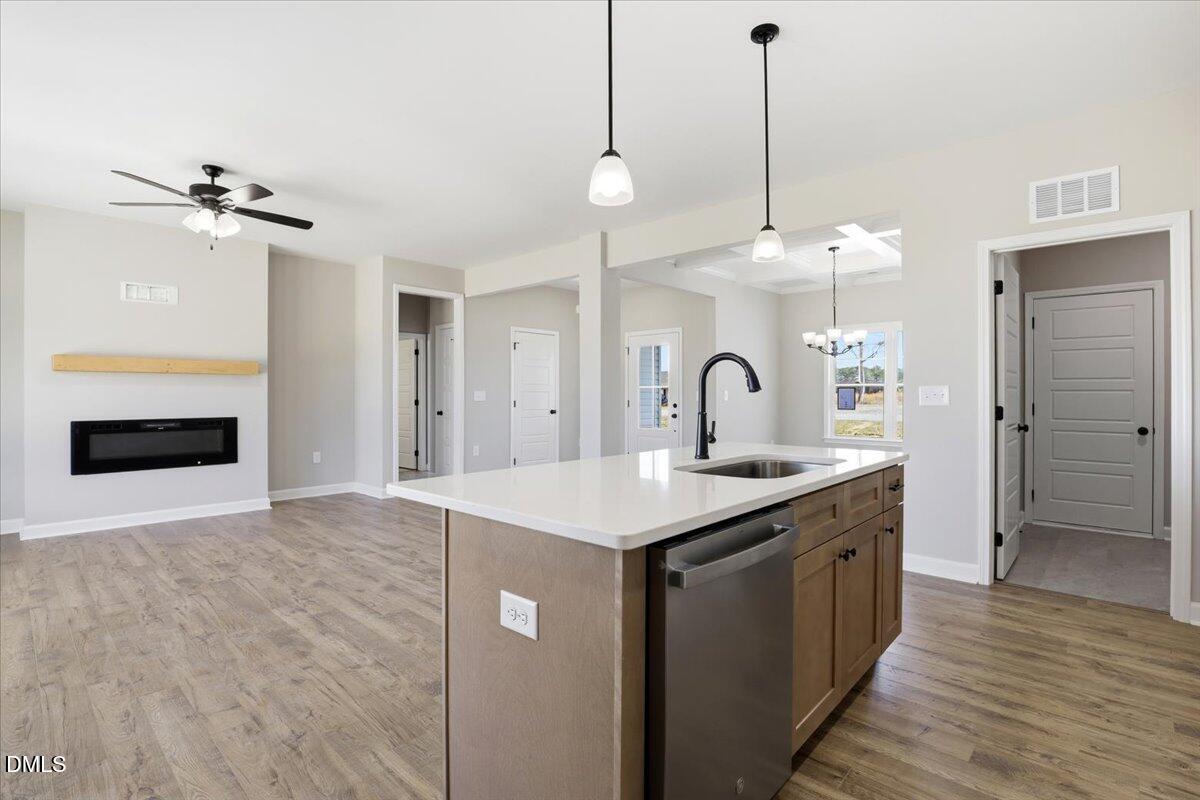 3696 Drew Farmer Road La Grange, NC 28551 - Photo 12 of 35 a kitchen with a sink and a refrigerator