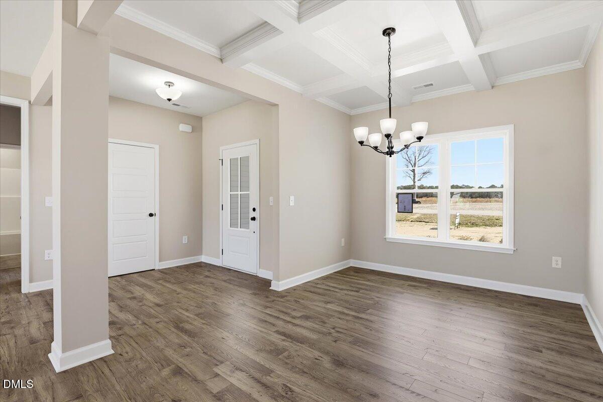 3696 Drew Farmer Road La Grange, NC 28551 - Photo 15 of 35 an empty room with wooden floor and windows