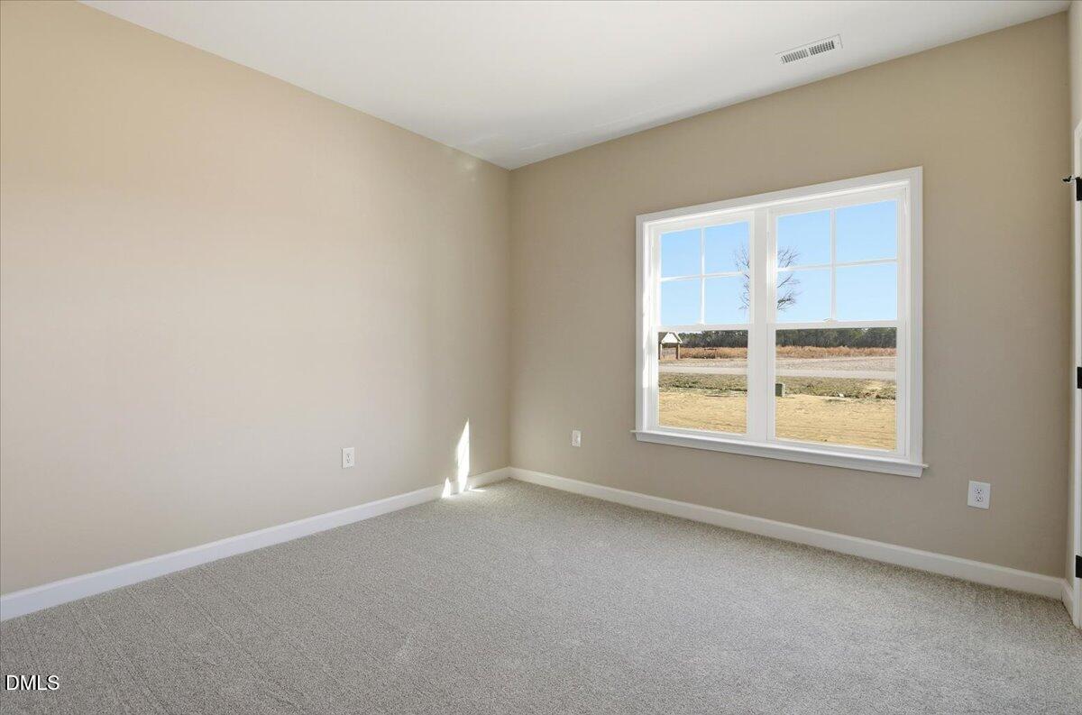 3696 Drew Farmer Road La Grange, NC 28551 - Photo 18 of 35 an empty room with a window
