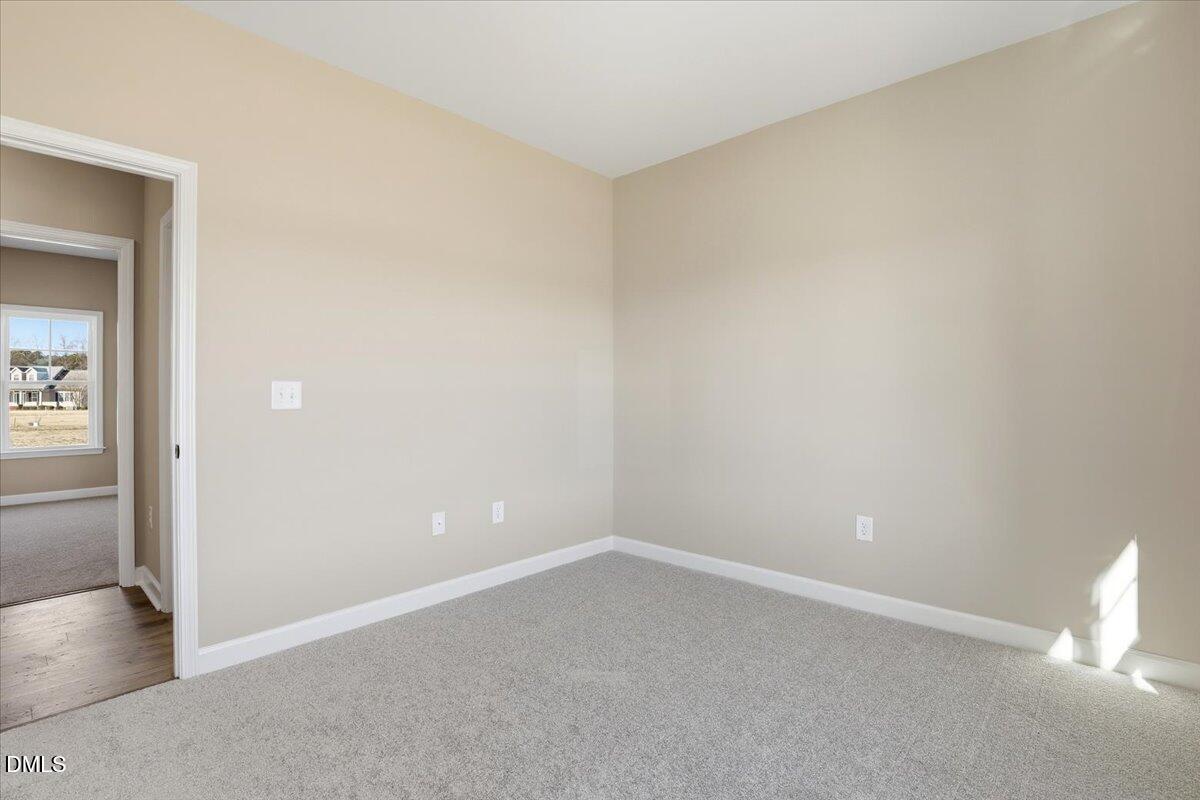 3696 Drew Farmer Road La Grange, NC 28551 - Photo 19 of 35 an empty room with a empty space and a fireplace