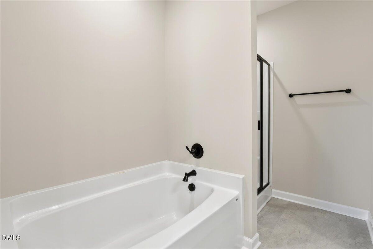 3696 Drew Farmer Road La Grange, NC 28551 - Photo 23 of 35 a bathroom with a bathtub