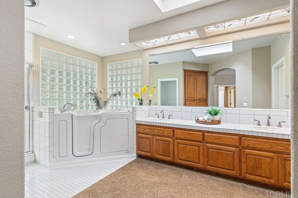 4327 Hollyhill Road Vista, CA 92084 - Photo 29 of 73 Primary Bath with Walk In Tub
