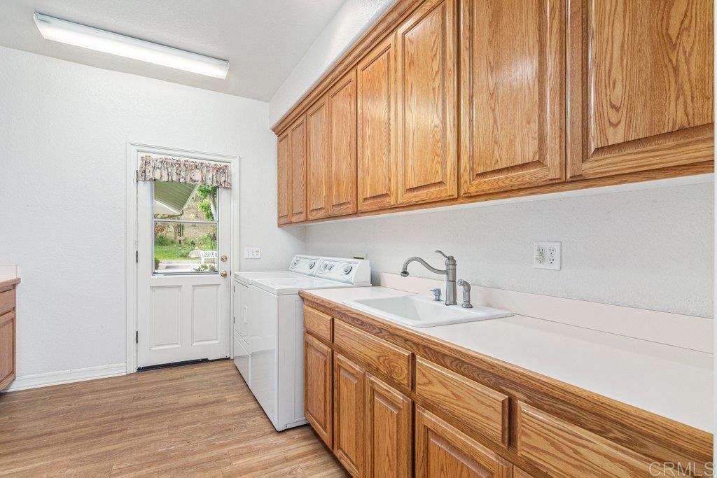 4327 Hollyhill Road Vista, CA 92084 - Photo 36 of 73 Large Laundry Room