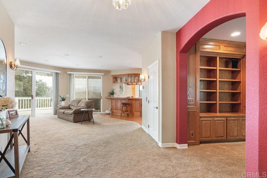 4327 Hollyhill Road Vista, CA 92084 - Photo 10 of 73 From entry looking past Living/Library to Family