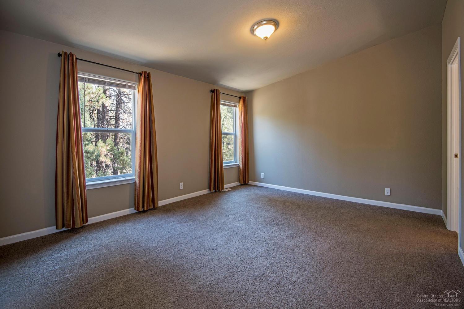 19770 Buck Canyon Road Bend, OR 97702 - Photo 13 of 23 Another view of the master bedroom. The