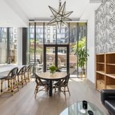 a view of a livingroom with furniture and window